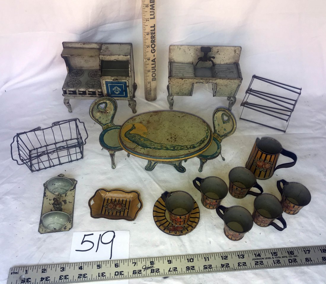 DOLLHOUSES, DOLLS, MINIATURES: Grouping of metal dollhouse kitchen furniture and mini 1029's dish set: tin playhouse range stove; double drainboard sink; wire basket; tin wall mounted sink; tin table and chaise; set of 6 dish set -