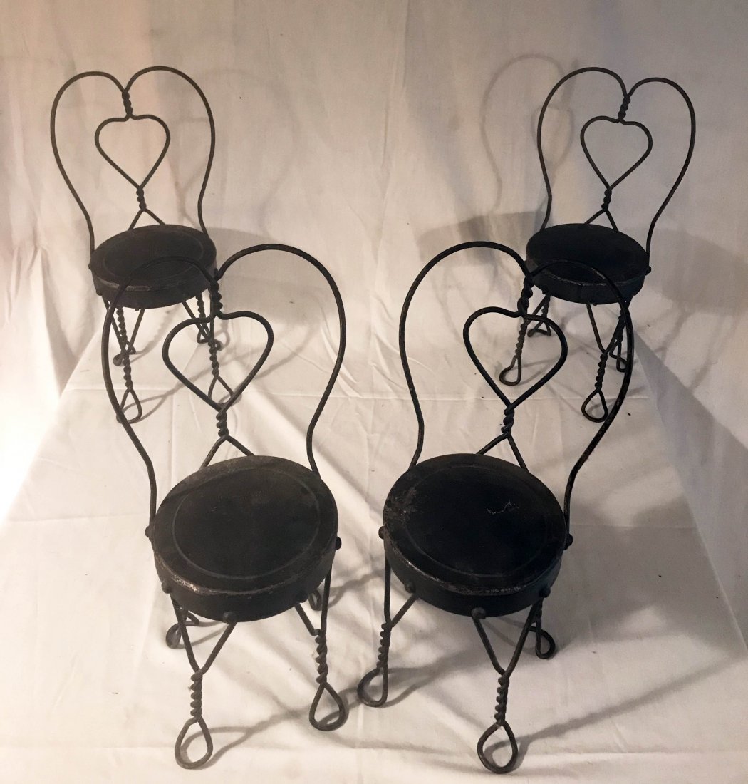 DOLLHOUSE, DOLLS, MINIATURES: Set of 4 doll size ice cream parlor chairs w/heart shaped backs, painted black, some scratches and surface rust visible on all 4 chairs, each 17 1/2" T x 6 1/2" seat diameter