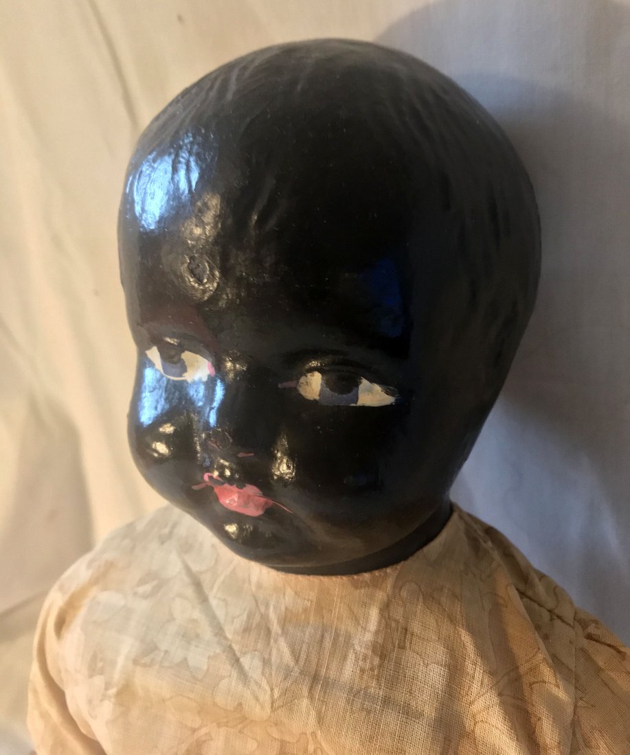 DOLLHOUSE, DOLLS, MINIATURES: Antique black composition lady doll w/composition hands and cloth body, handpainted face, vintage faded blouse and skirt, legs need restringing, approx. 18" L
