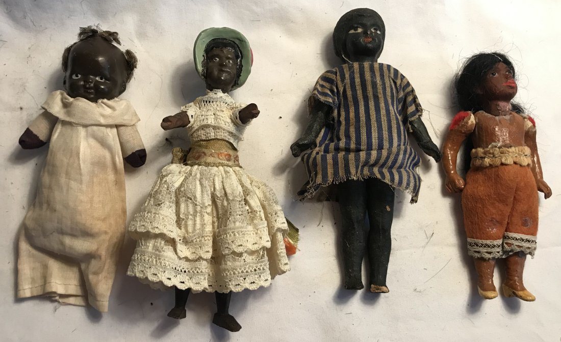 DOLLHOUSE, DOLLS, MINIATURES: Grouping of 4 black dolls including: china head baby painted black having puffs of hair attached to head, painted eyes and mouth, cloth arms and “pillow” type body with linen dress, minor wear to 
