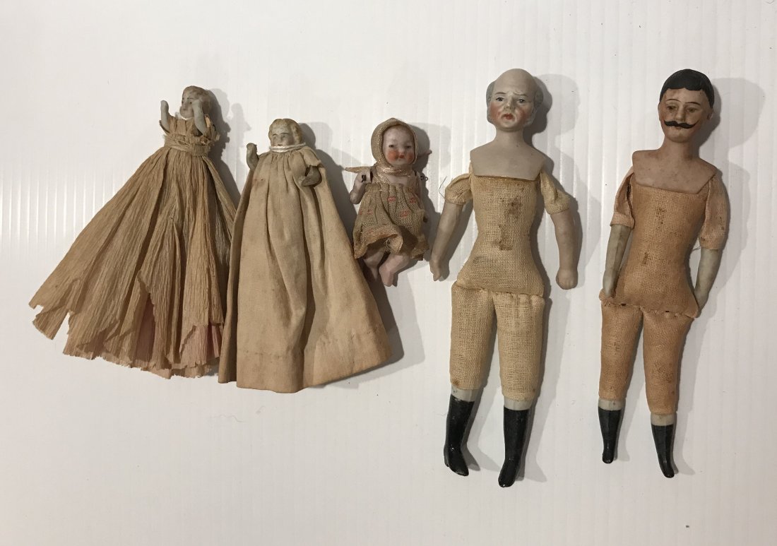 DOLLHOUSE, DOLLS, MINIATURES: (5) Miniature bisque head dolls, all w/molded hair: (2) men: 1 w/handle bar mustache, signed 8/o, cloth body, 5 ¾” T; other man w/grey/white molded hair, cloth body marked 390-8/0, 6” T; baby gir