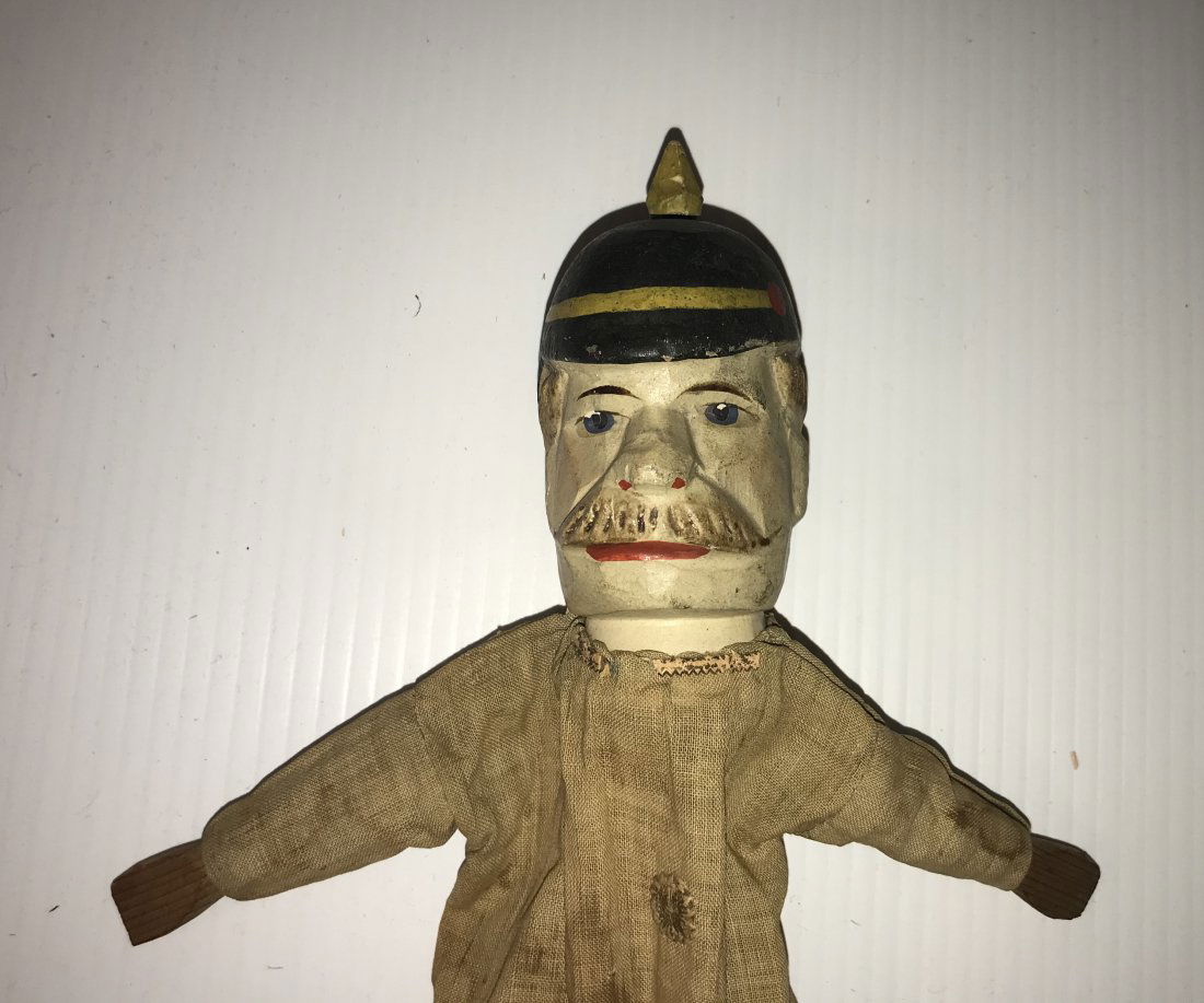 DOLLHOUSE, DOLLS, MINIATURES: Vintage puppet, figure of a man w/carved wooden head having a handpainted uniform hat in black, yellow and red, brownish/blonde hair and mustache w/wooden hands legs and feet, body w/cloth tunic and p