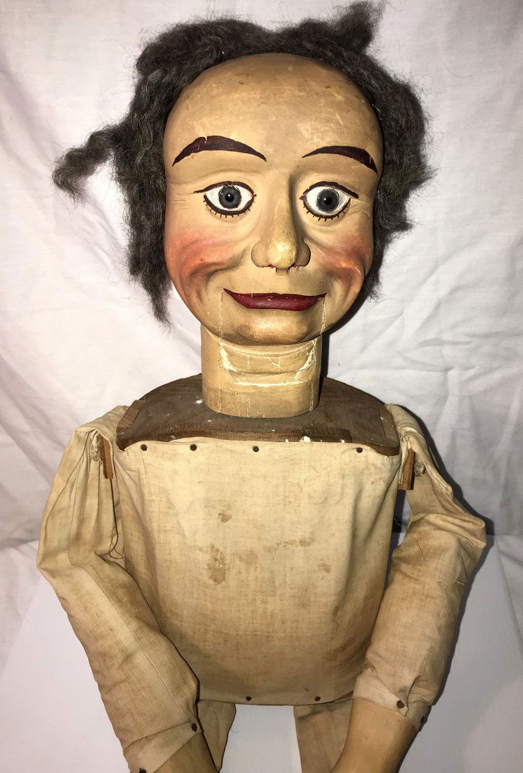 DOLLHOUSE, DOLLS, MINIATURES: Large antique puppet, figure of a man having a carved wooden head w/handpainted face and swiveling head w/movable mouth, having a hand mechanism mounted in a wooden torso, wooden hands w/cloth legs an