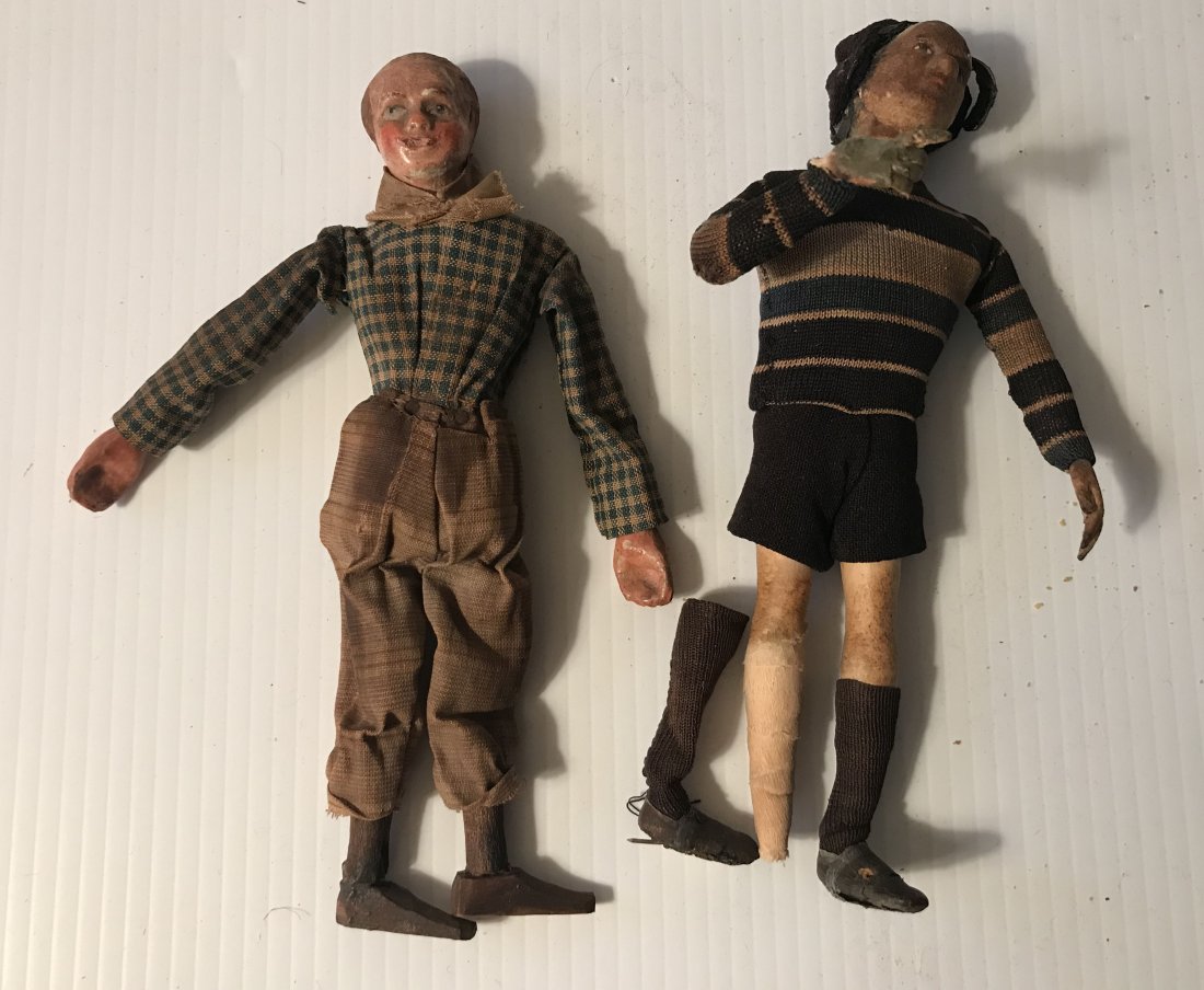 DOLLHOUSE, DOLLS, MINIATURES: (2) vintage dolls: a figure of a boy (similar to a marionette) w/composition type head and hands, wooden legs and feet, jointed body, handpainted face, wearing a scarf, blue checked shirt and plaid pa