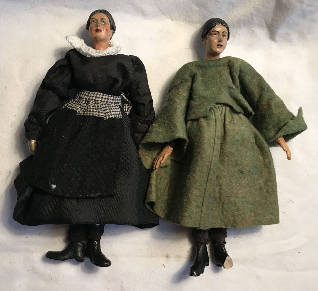 DOLLHOUSE, DOLLS, MINIATURES: (2) vintage Saba Bucherer metal ball jointed and composition figures, 1920Â’s character dolls, stamped on metal body Â“Made In Switzerland Patents Applied ForÂ”; 1 dressed in black satin dres