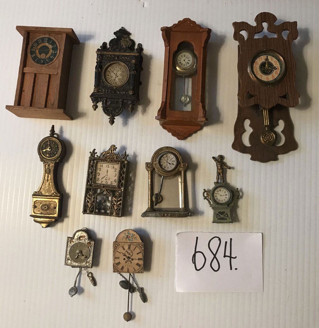 DOLLHOUSE, DOLLS, MINIATURES: Group of wooden and/or metal dollhouse clocks: regulators, mantle, wag on the wall, etc.