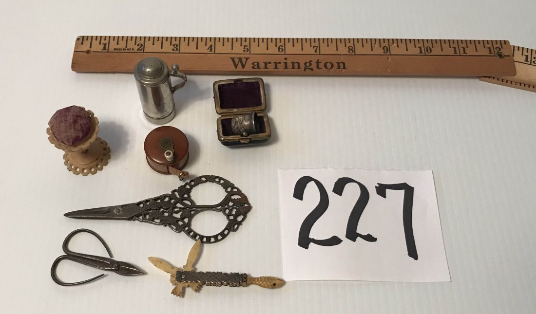 FURNITURE, ACCESSORIES, COUNTRY COLLECTIBLES, TOYS, ETC: Group of sewing items: (2) thimble holders w/thimbles-1 sterling, measuring tape in plastic case, pin cushion on stand, (2) pairs of scissors, manicure piece w/fish design