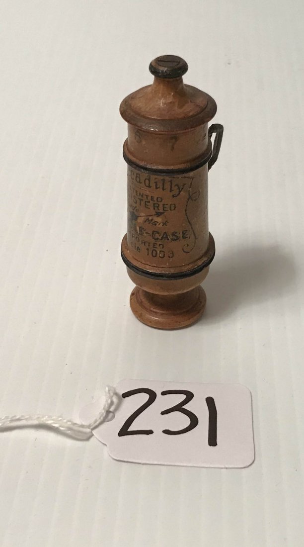 FURNITURE, ACCESSORIES, COUNTRY COLLECTIBLES, TOYS, ETC: Wooden pin case in the shape of a stein marked Piccadilly Needle Case, top turns release the needles from a hole in top, sizes 4, 5 6 7 8, 9, marked German, shows wear, finish wear, scratching, approx