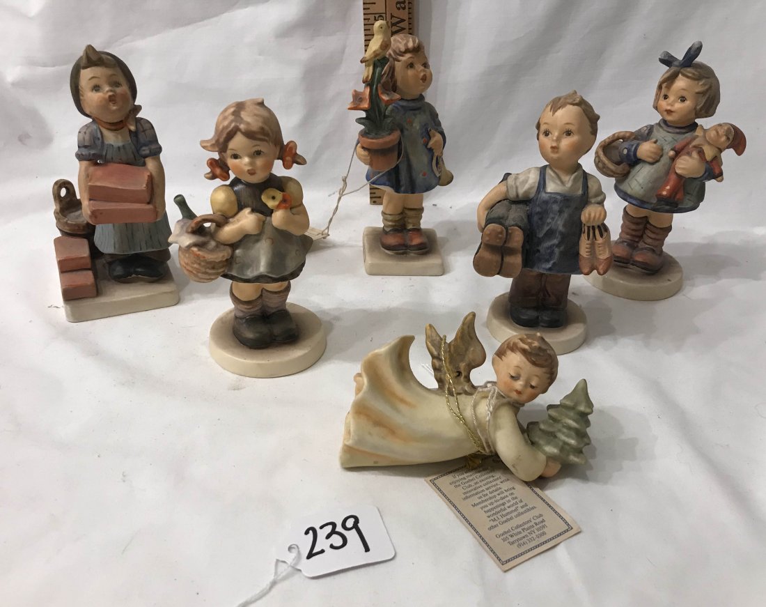 HUMMEL FIGURINES: Grouping of 6 Hummel figurines: Flying High Angel-First Edition; #17/0 Congratulations; #143/0 Boots; #305 The Builder-crazed bottom; #422 What Now; 563/0 Little Visitor
