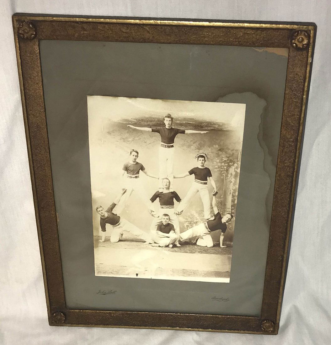 FURNITURE, ACCESSORIES, COUNTRY COLLECTIBLES, TOYS, ETC: Vintage photograph of 7 male acrobats in costumes posing, mat marked John Bell/Barrhead, mounted in a gold gessoed frame, mat shows some paper loss upper right hand corner, staining in right hand corn