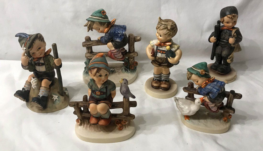 HUMMEL FIGURINES: Grouping of 6 Hummel Figurines: 12/I Chimney Sweep, 111/I Wayside Harmony (crazing on bottom), 195 2/0 Barnyard Hero (crazing on base), 201/I Retreat To Safety, 315 Mountaineer, 399 Valentine Joy