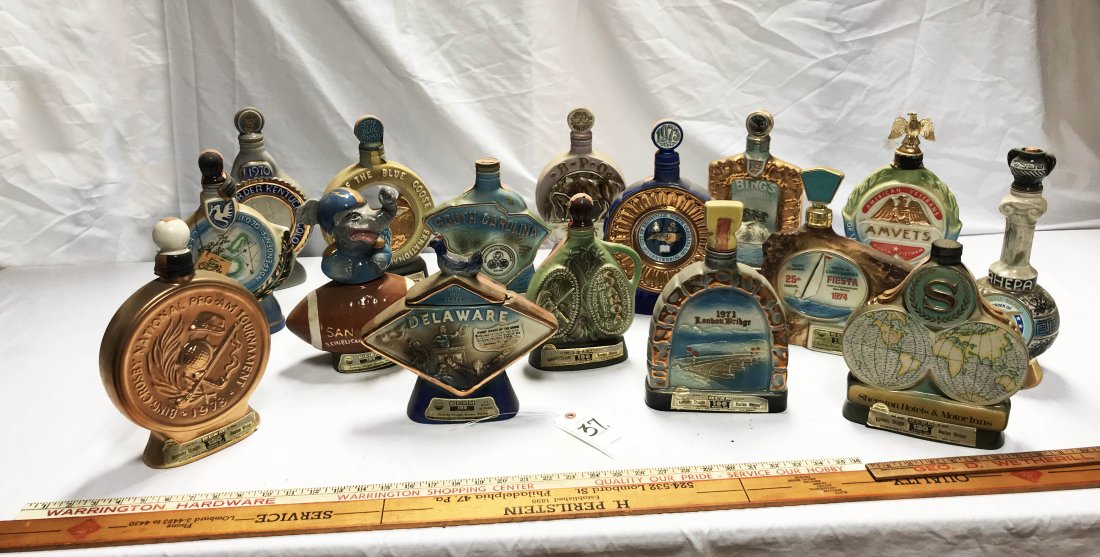 Lot of 16 Beam Bottles Decanter: The International Honorable Order of the Blue Goose (L); The 50th Anniversary of the BPO Does; 1670-1970 S. Carolina Commemorative Bottle; 1974 Truth or Consequences Fiesta (L); 25th Anniversary Bottl