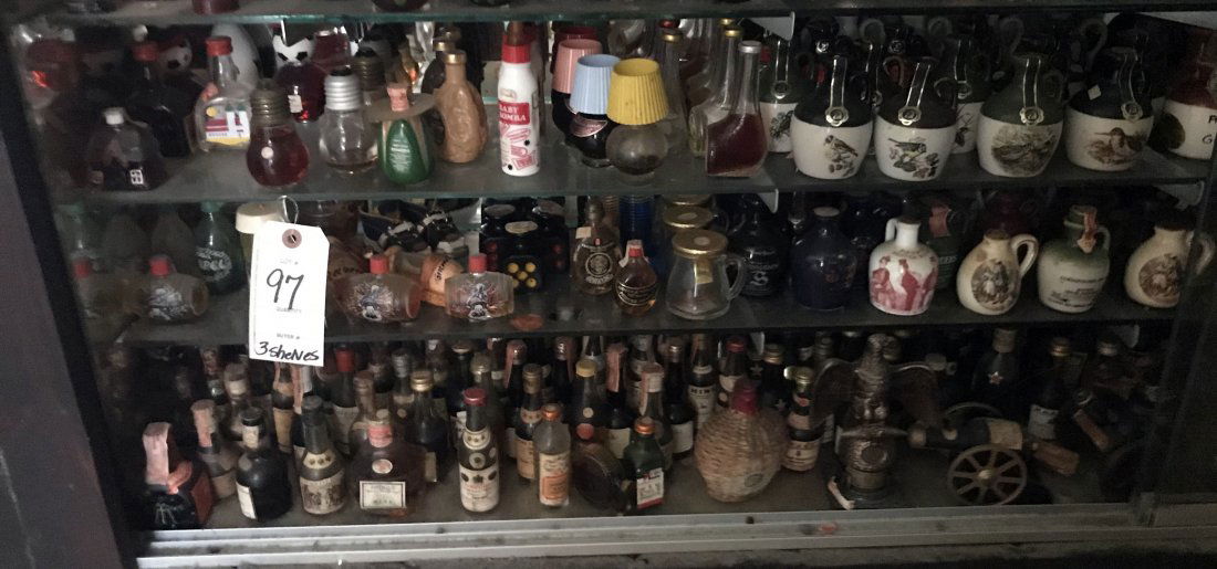 Grouping of Figural Bottles/Decanters: Approximately 75+ liquor bottles-some clear, figural, etc.; approx. 16 Jim Beam figural bottles - fox motif