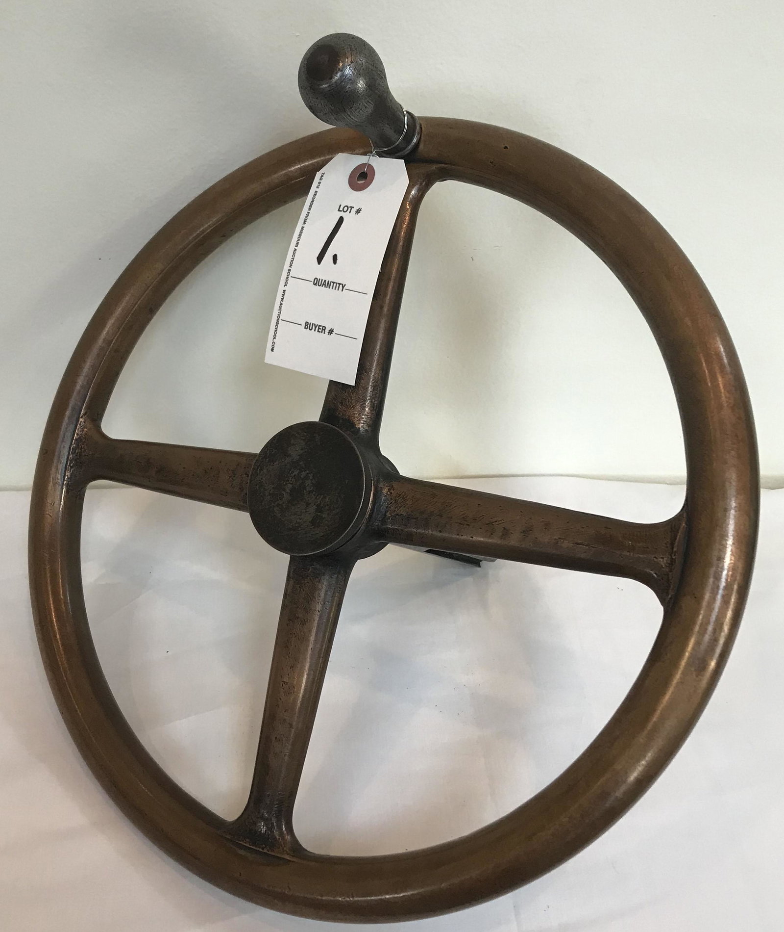 Brass Control Wheel: Vintage brass control wheel w/spinning steel knob and steel shaft, marked on underside K 25, approx. 15" diameter x 11" D w/shaft