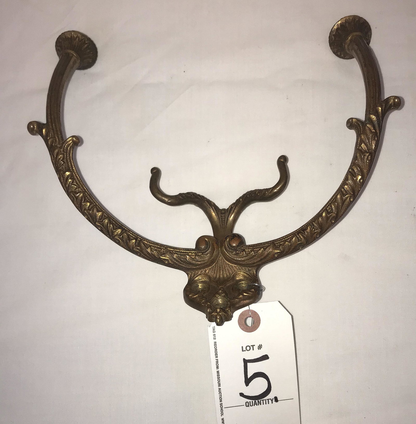 Vintage Brass Hat/Coat Hook: Vintage brass wall mounted hat/coat hook w/2 branches, bracket w/3 screwholes, ornate leaf and scroll design, marked #108, old original surface; approx. 7 1/2" T x 9 1/4" W x 6 " D