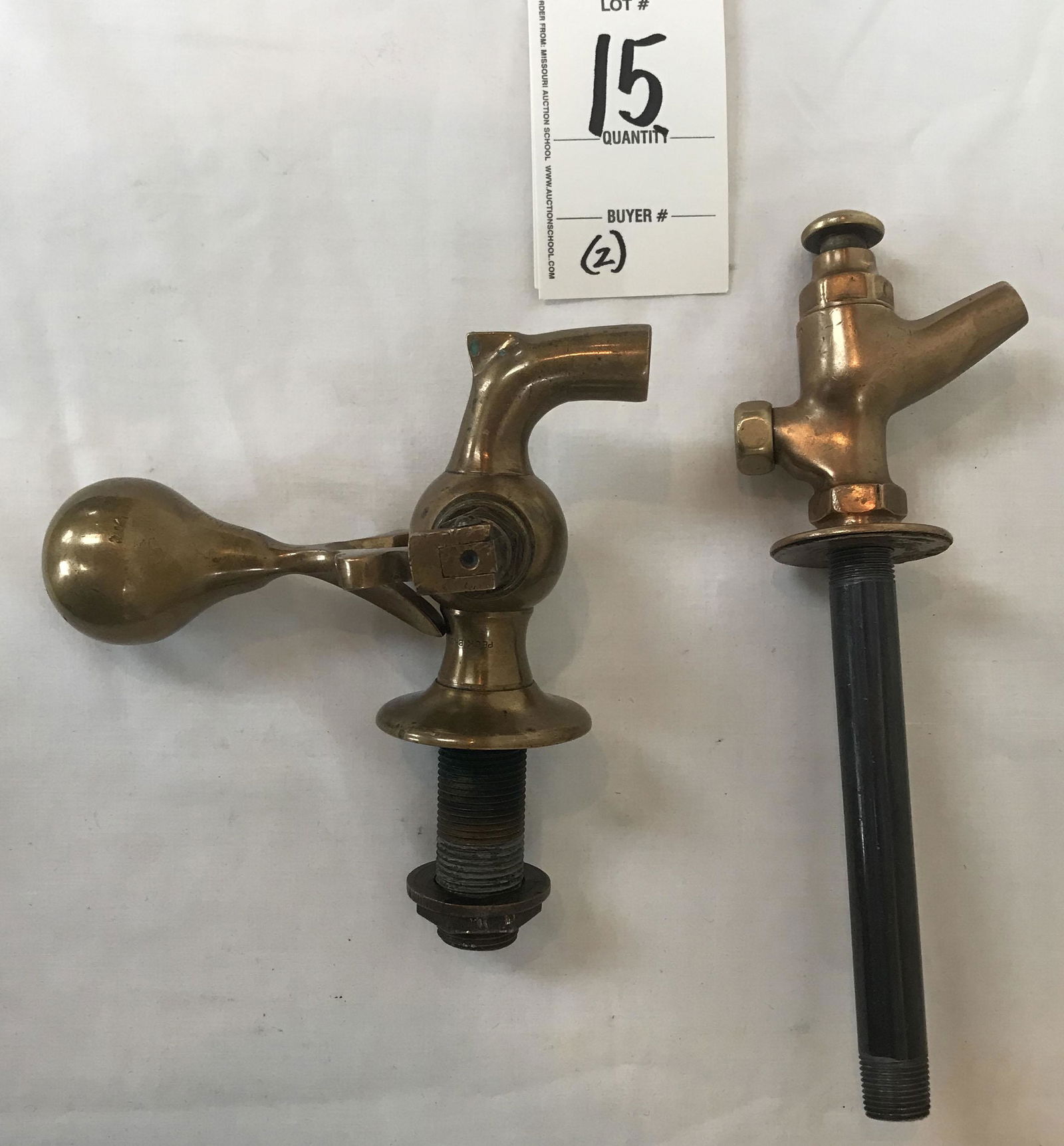 2 Vintage Taps: 2 vintage taps: 1 w/round ball handle, pulls forward w/stop, marked Peck Bro's and Co., New Haven, Conn, 6 1/4" T x 4" D (w/o threaded pipe)-6 1/4" overall depth AND a brass ice water tap, marked Cran