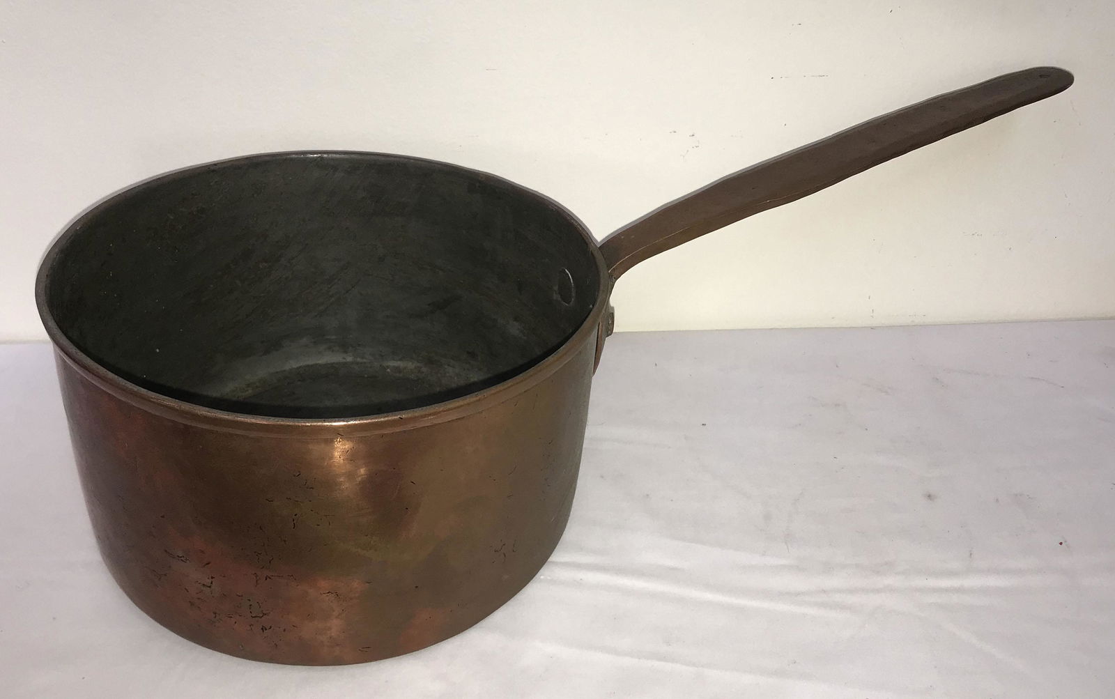 Vintage Copper Pot: Vintage copper pot w/handle, dovetailed construction, applied handle w/heart shaped design, handled impressed w/"20"; 5 3/4" T x 10 3/8" diameter; handle 11 1/2" L