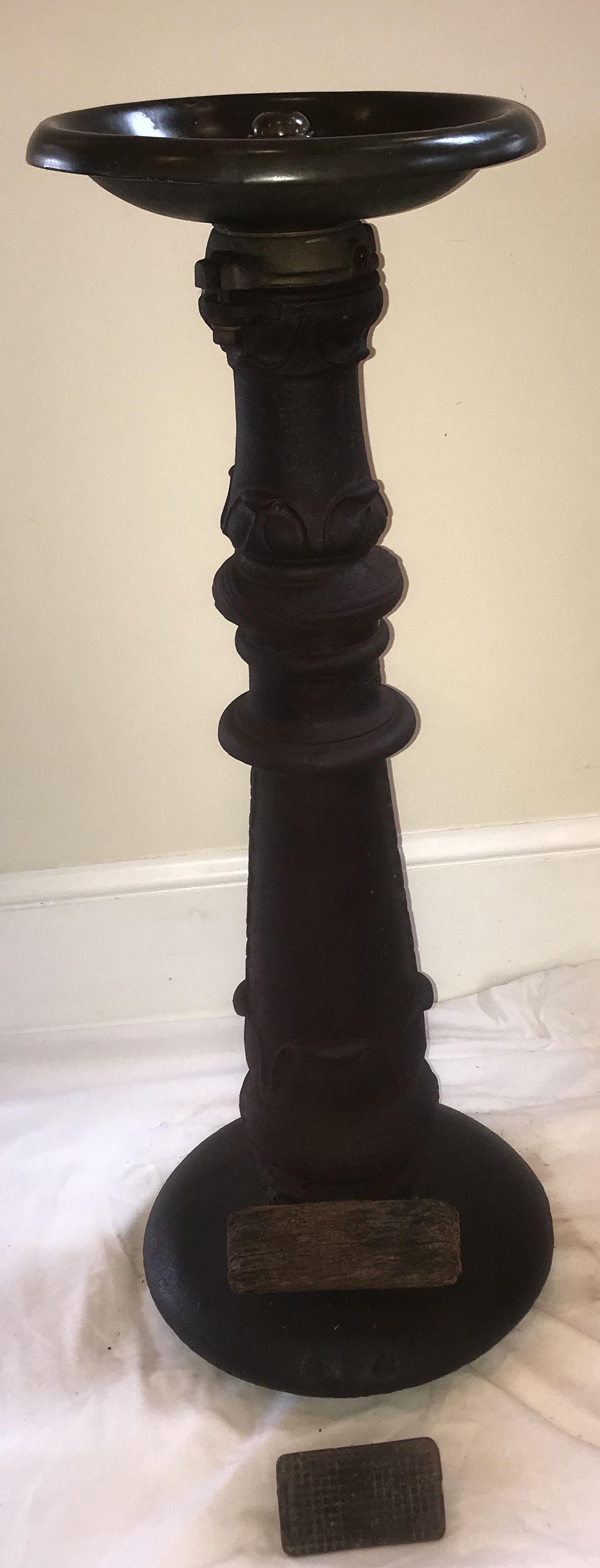 Antique Water Fountain: Antique water fountain w/round bronze top and center spout mounted on a cast iron column w/leaf design ending on a round base, wooden foot pedal, foundry mark Murdock, Bubble Fount, pat. 7/20/1915/191