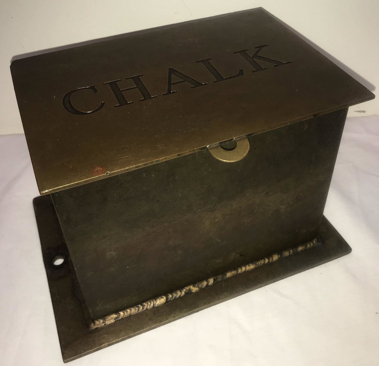 Vintage Brass Chalk Box: Brass chalk box, hinged lid, rectangular w/base having 2 bolt holes, original old surface and patina, normal surface scratches and roughness, 6 1/2" T x 8 " W x 5 1/2" D (box dimension); base 10" W x 