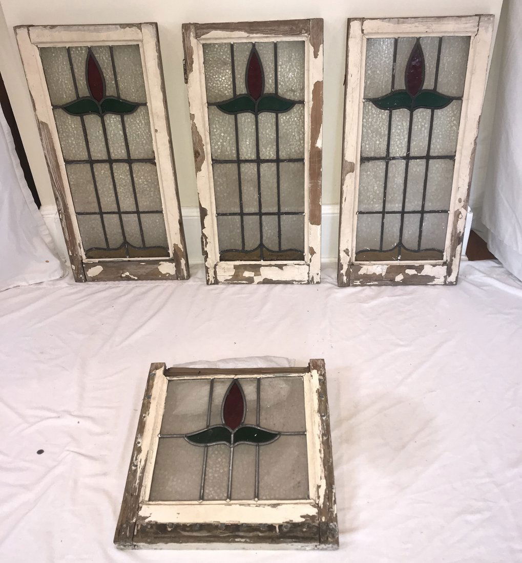 4 Vintage Stained and Leaded Glass Window Panels: Grouping of 4 vintage stained and leaded glass window panels, red single flower petal and leaf design w/transluscent/clear and amber glass panes, (3) rectangular panels, 31 1/2" T x 15" W; (1) 16" T x