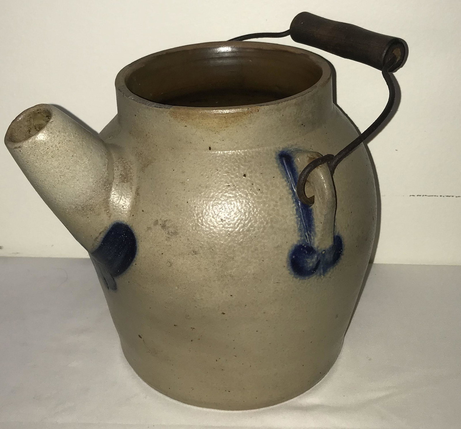 Blue Decorated Batter Jug: 19th century blue decorated gray stoneware batter jug w/wirework and wooden handle, marked F.H. Cowden, Harrisburg, no lid, 7 3/4" T x approx. 7" diameter, top diameter 4 7/8"