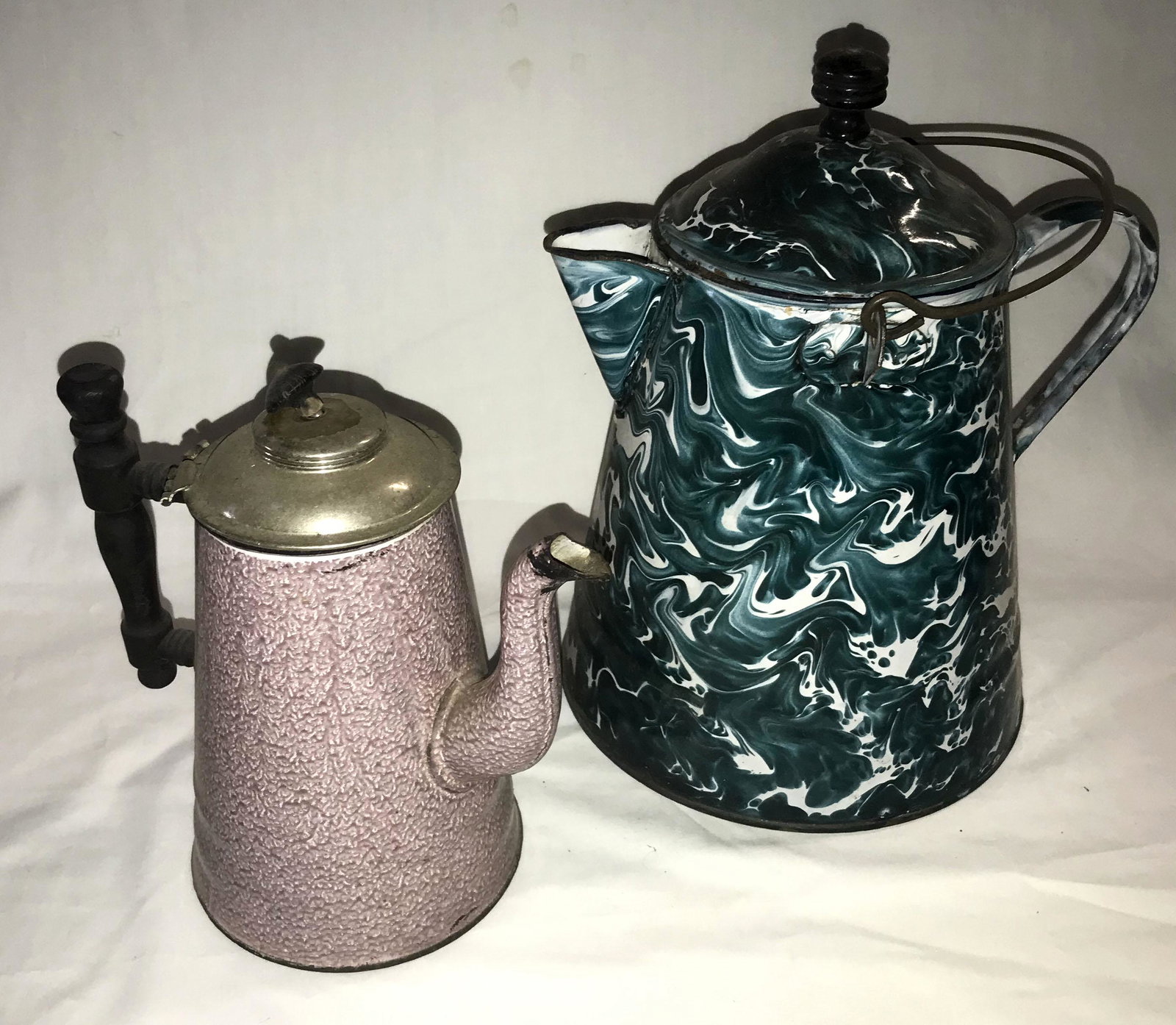 Vintage Agate Coffee Pot: Vintage green and white agate coffee pot with fixed handle and attached wirework handle, good overall condition, some chipping visible on lid and top rim, old brown discoloration and chipping on base,