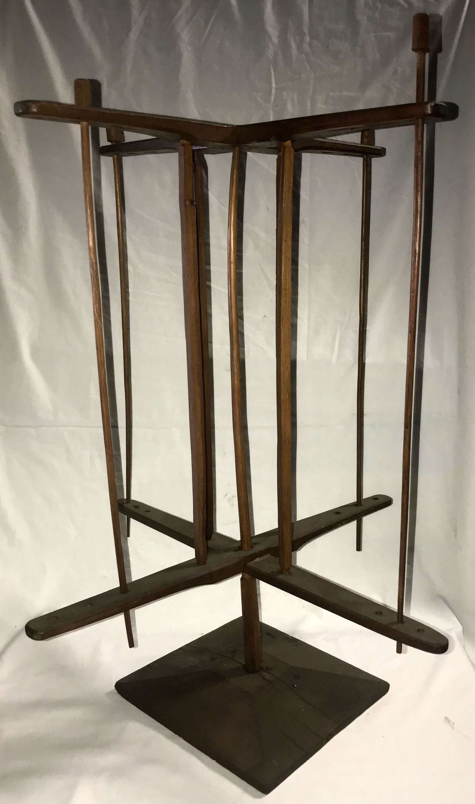 Country Primitive Knitty Knotty: Antique country primitive wooden "knitty knotty" in 2 pieces, revolved on base, old finished surface; 32 1/4" T x 26" square; base of stand 11" x 11 1/2"