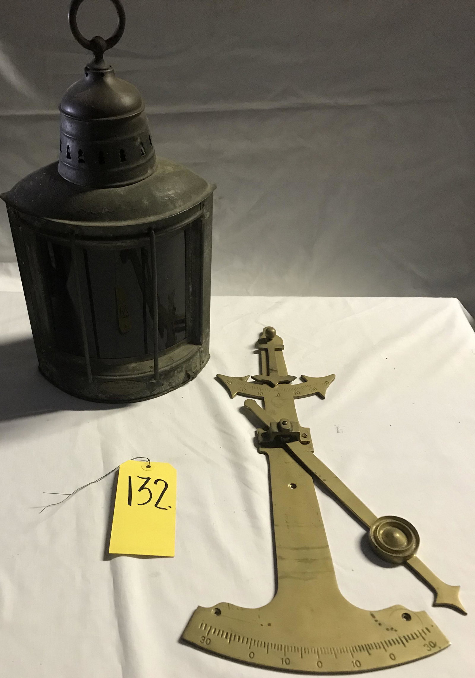 Tin Ship's Lantern AND Nautical Sextant: Vintage tin ship's lantern w/bowed front and red glass lens, marked Geo. B. Carpenter & Co. Ship Chandlers, Chicago, rust and some metal loss visible at base, original old surface w/discoloration 16 3