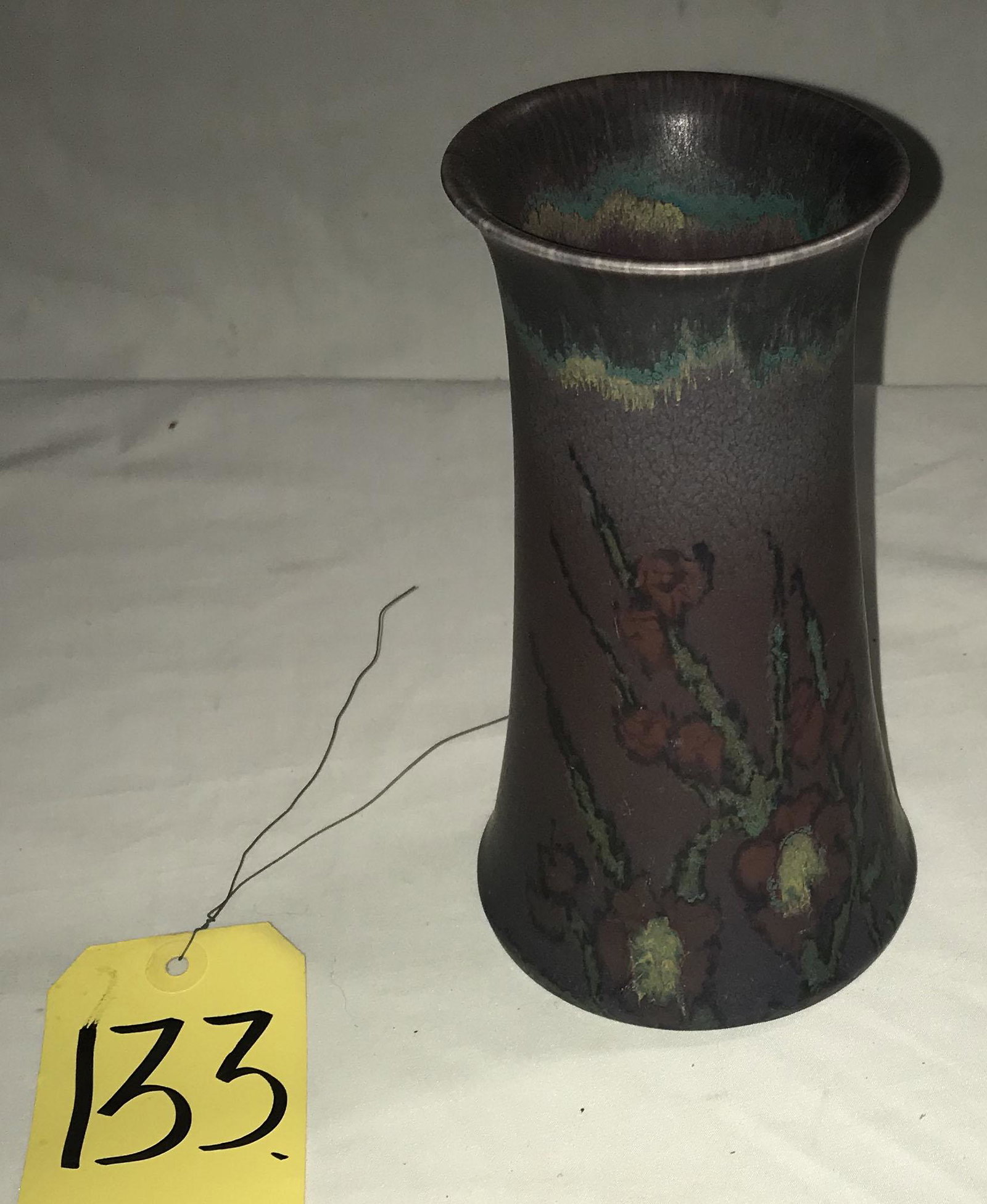 Rookwood Pottery Vase: Vintage Rookwood pottery vase, matte glazed finish in lavender, blue, ivory and red, floral design, flame mark, XXII, regular 2063, artist initials VT, good overall condition, 7" T x 4 3/8" base diame