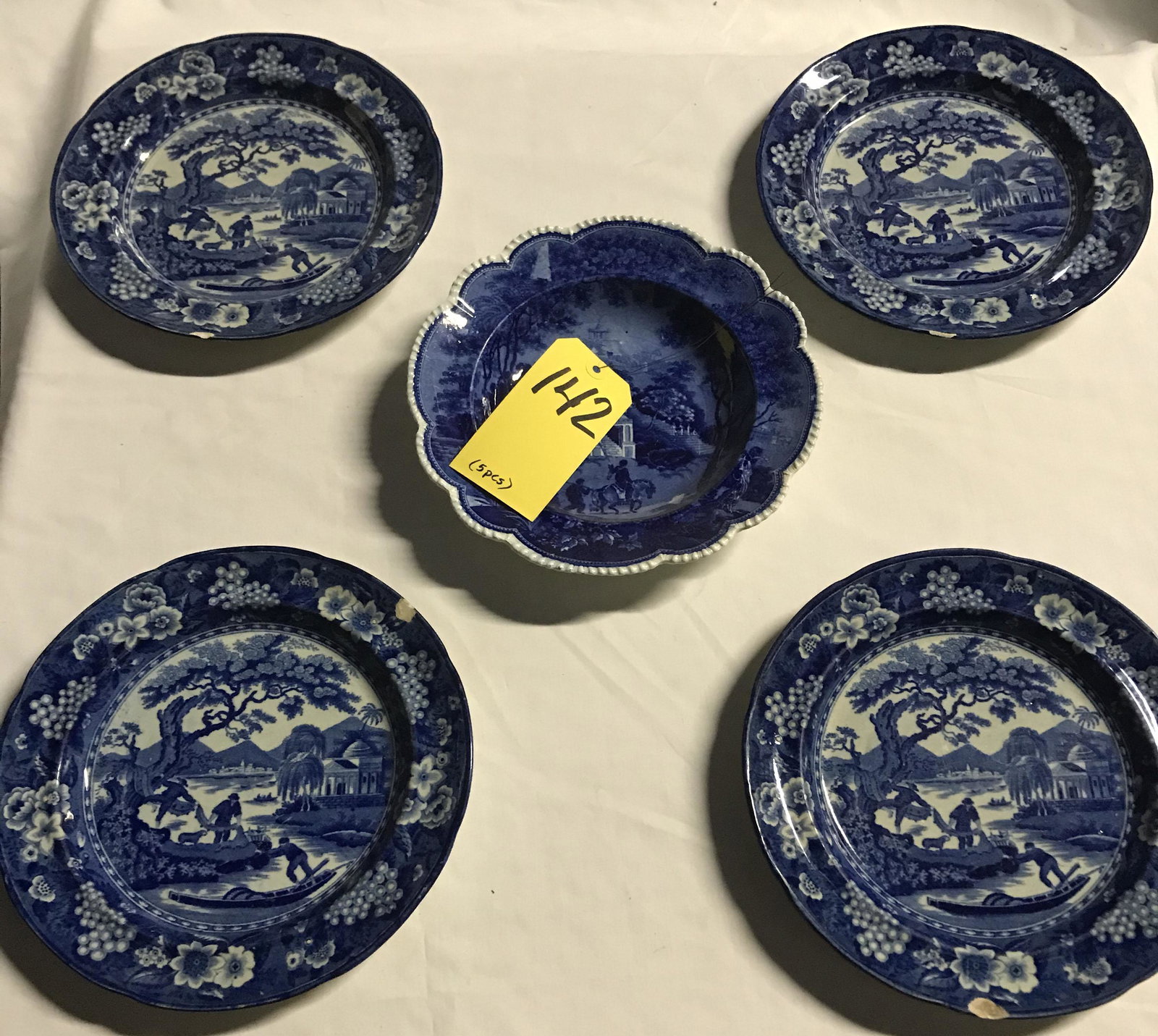 Blue Staffordshire Soup Bowl: Antique blue Staffordshire soup bowl, landscape scene w/man on horse back, unmarked, old glaze, imperfection in making, 1" T x 9 3/4" diameter AND (4) antique blue Staffordshire plates, landscape patt