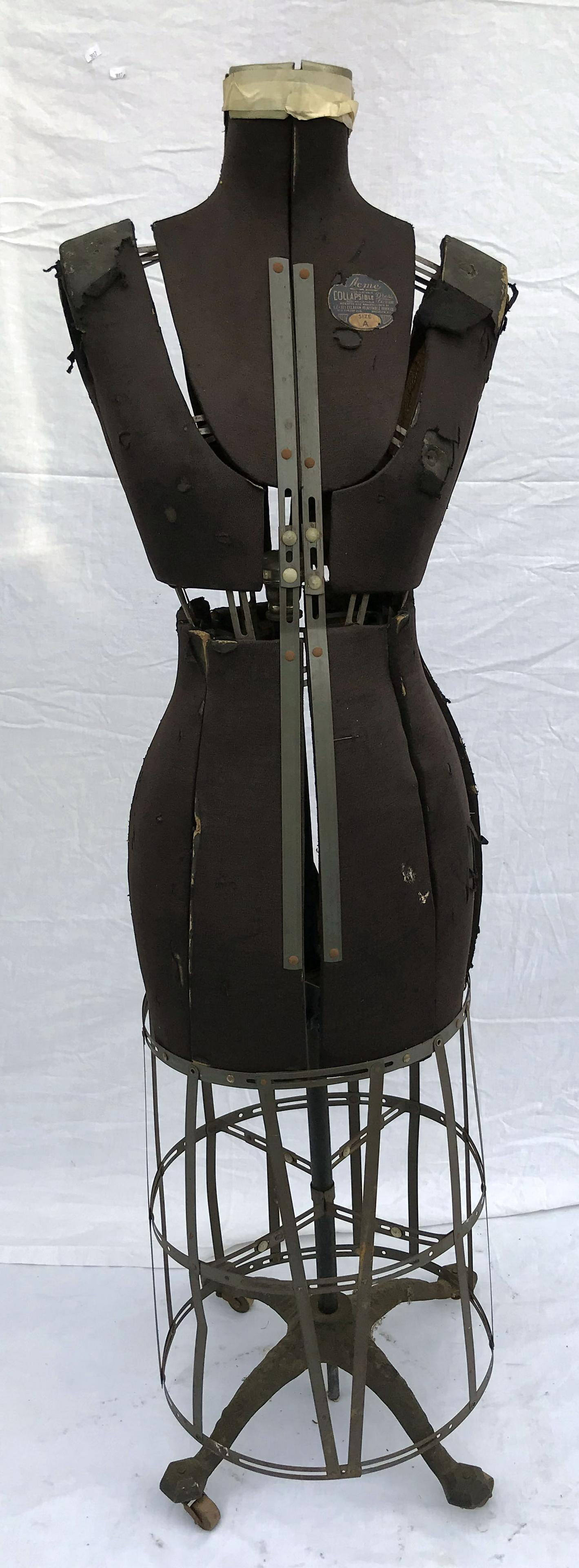 Vintage Dress Form-Acme Adjustable Dress Form: Vintage woman's dress form paper label marked Acme Adjustable/Collapisible dress form, Ellanam Adjustable Form Co., Brooklyn, NY, Size A, steel column mounted on a cast iron base, fabric torn and worn