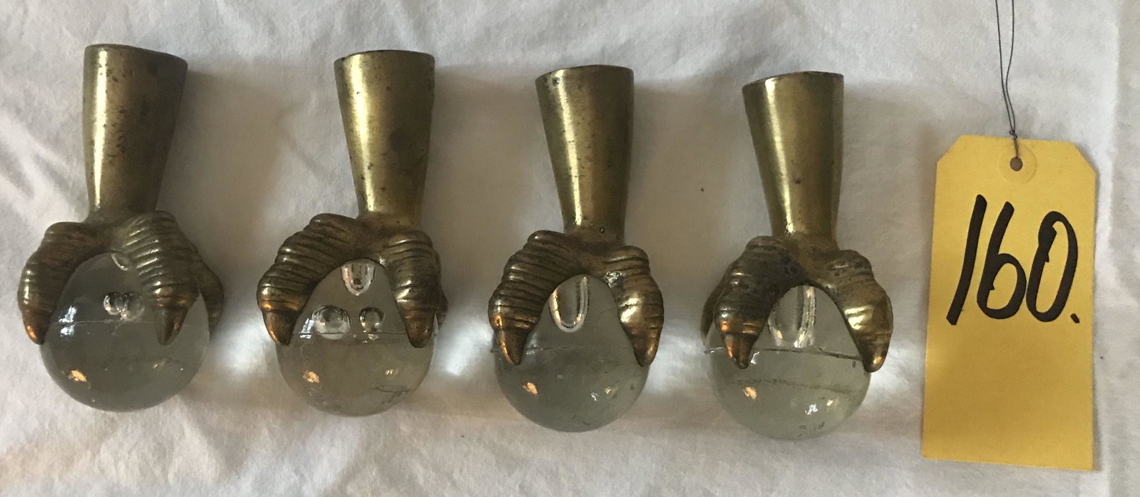 Vintage Brass Furniture Feet: Set of 4 vintage brass claw furniture feet w/clear glass ball ends, each w/1 hole for attachment, probably used for a plant stand, some glass balls show internal bubbles, some chipping and normal age 