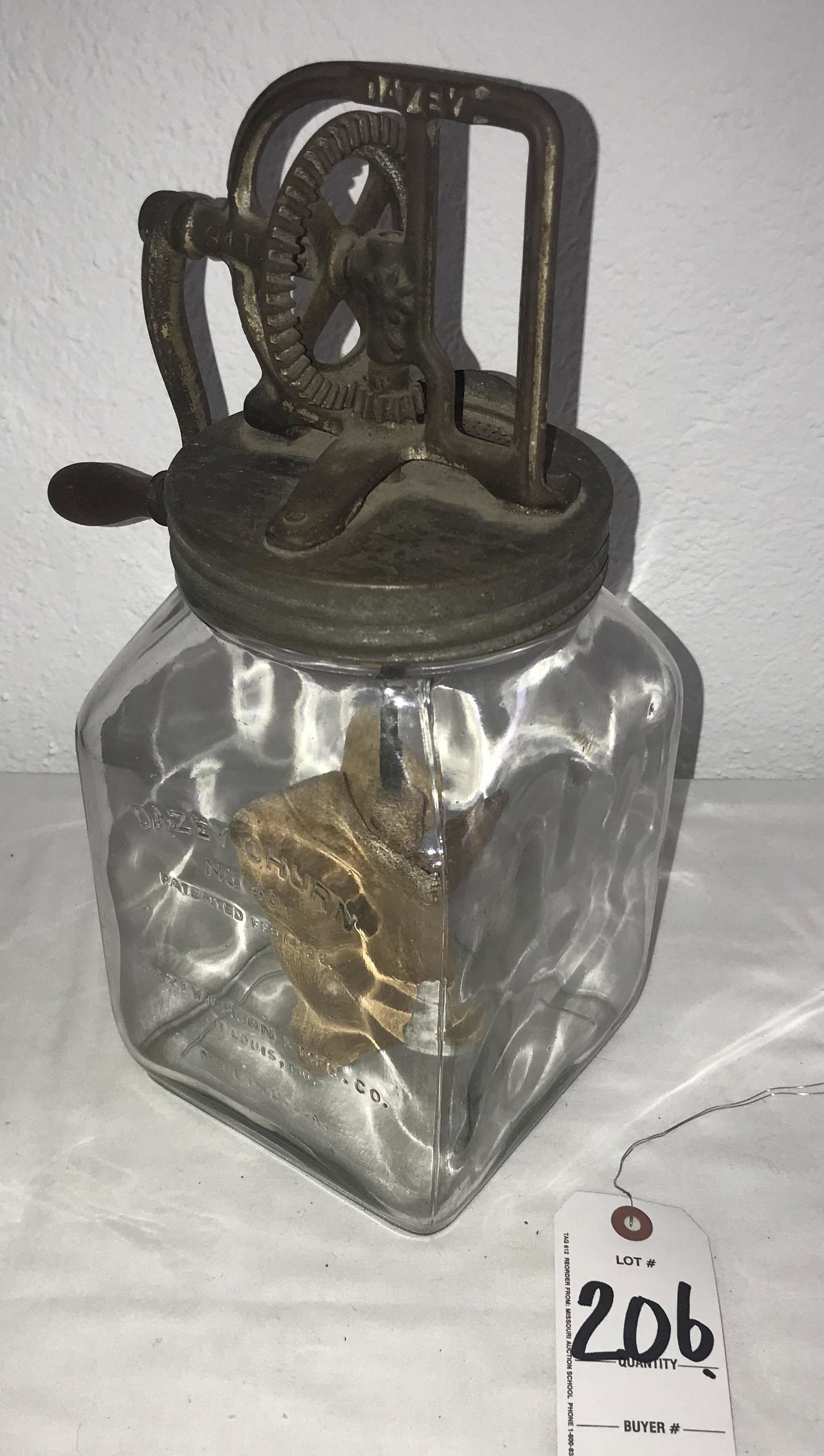 Vintage Butter Churn: Vintage butter churn, manual crank handle w/metal top lid, wooden paddles, clear glass jar marked Daisey Churn No. 40, St. Louis, MO., daisy flower on base of jar, normal old wear, rust and pitting on