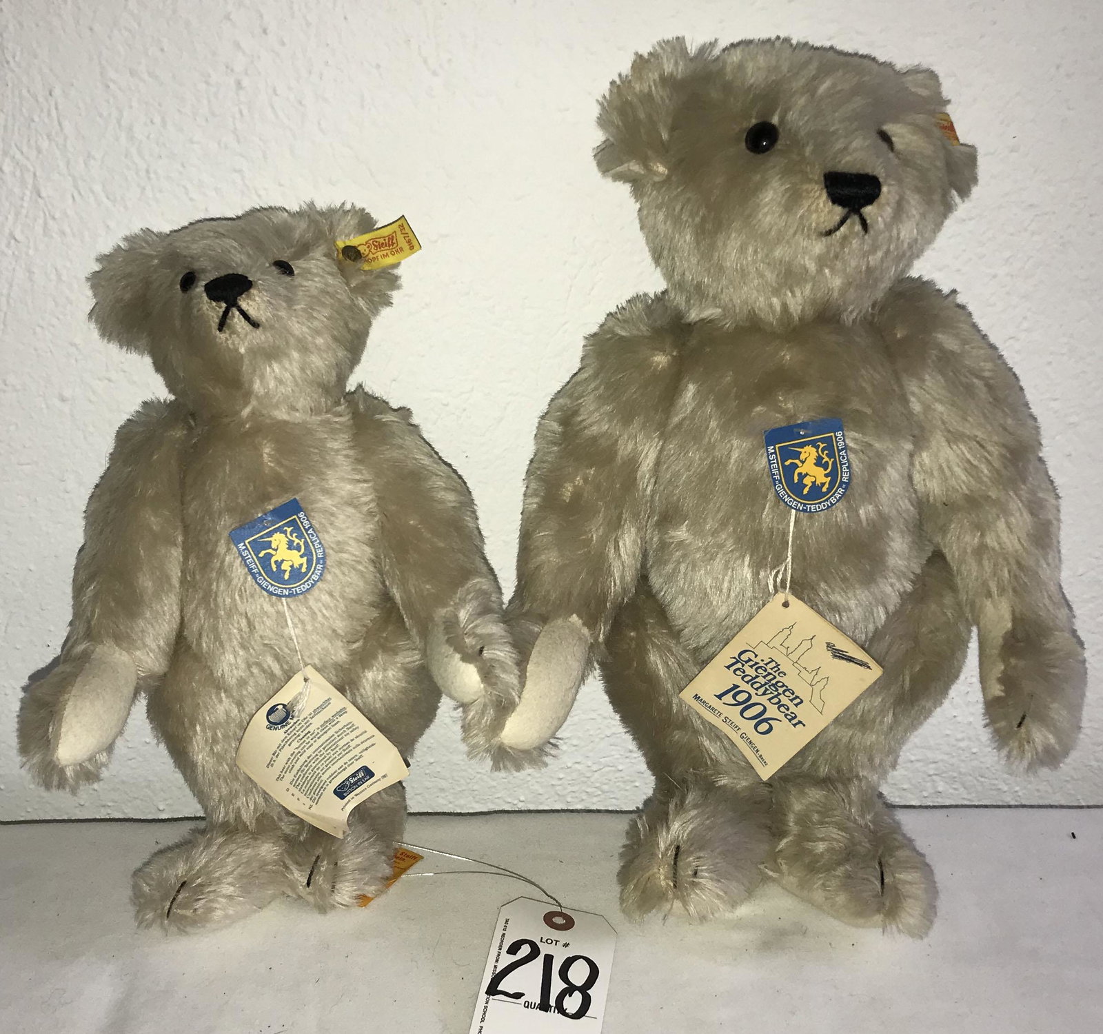 2 Steiff Replica Teddy Bears: (2) Replicas of the Giengen Teddy Bear 1906, jointed bodies, cardboard tags and chest tag marked M.Steiff Giengen Teddy Bear Replica 1906 (50% cotton/50% wool), each w/ear buttons and cloth tag, ear t