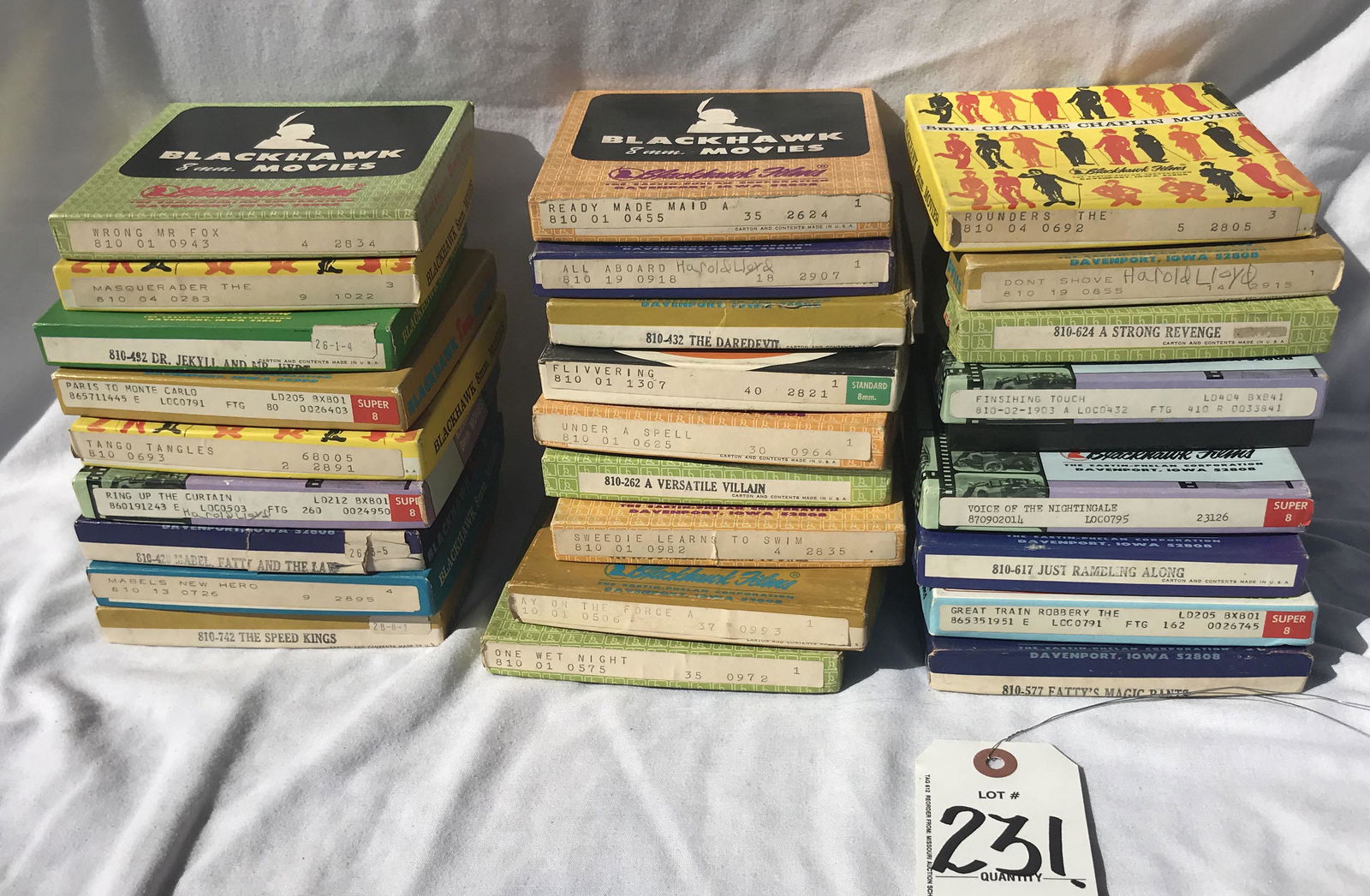 Grouping of 8 MM Movies: Grouping of (26) 8 MM movies. Condition of movies unknown. Catalogued as found, cannot verify the movie in the box is actually what's titled on box--film has not been put through projector or otherwis