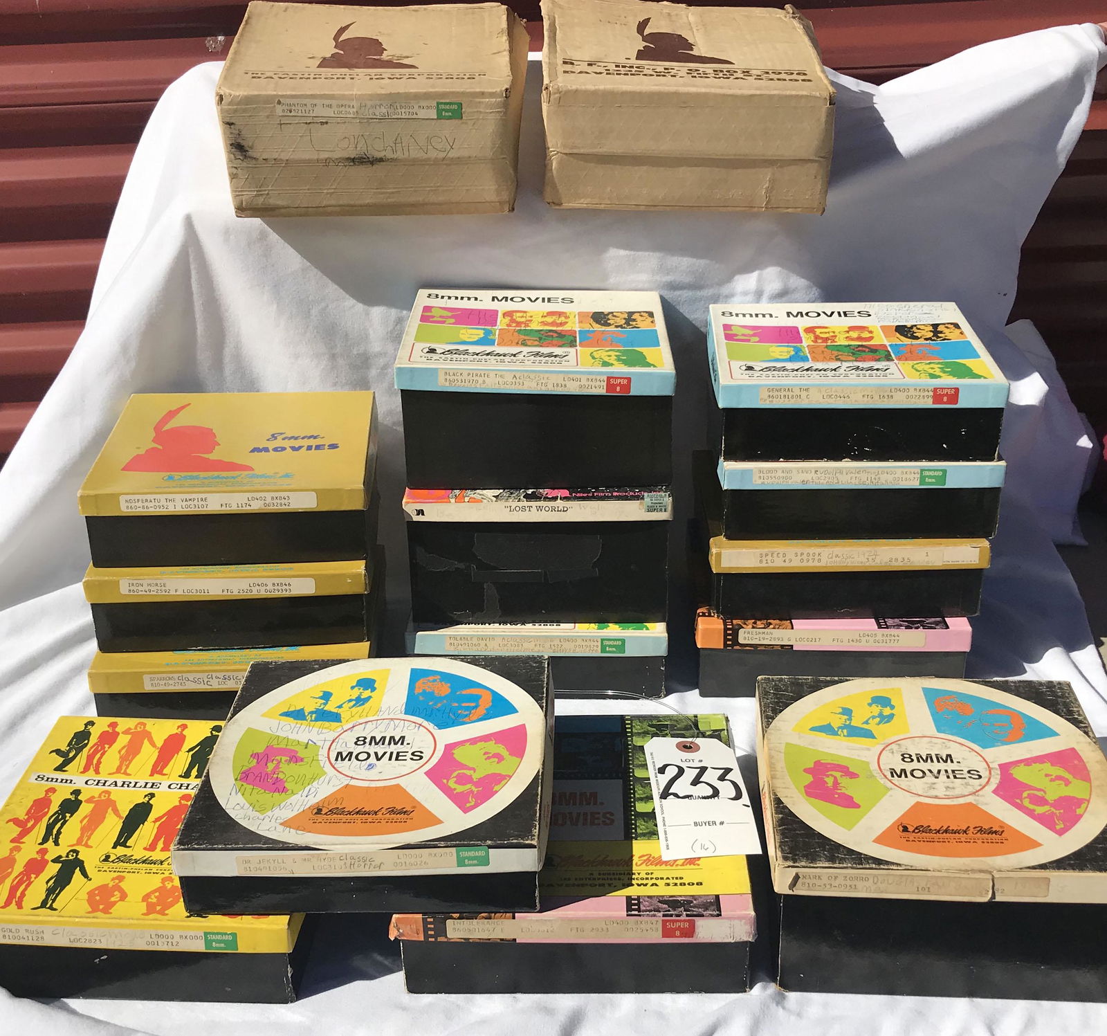 Grouping of 8 MM Movies: Grouping of (16) 8 MM movies. Condition of movies unknown. Catalogued as found, cannot verify the movie in the box is actually what's titled on box -- film has not been put through projector or otherw