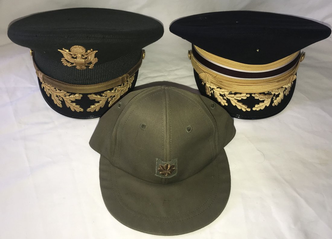 Grouping of Vintage Military Hats: Grouping of vintage military hats: visor cap in green felt w/gold colored E.Pluribus Unum emblem, black bill w/oak leaves and acorns, made by Flight Ace, San Antonio, Texas (size 7), felt shows moth d