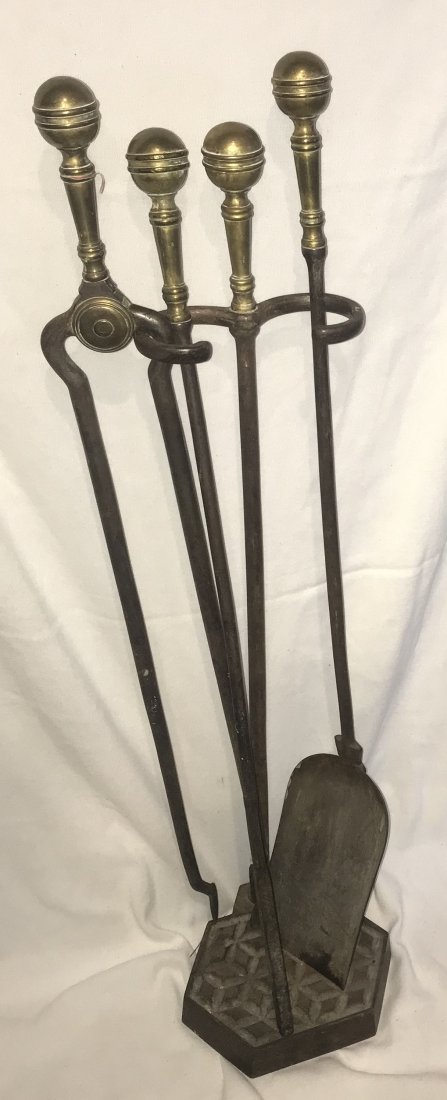Vintage Fireplace Tool Set: Set of vintage fireplace tools: tongs- 31 3/8" L, poker-31 1/2" L and shovel-32 3/4" L w/cast iron stand-32 1/8" T, base 8 1/4" W x 7 1/2" D having a hexagonal base w/diamond form decoration, all piec