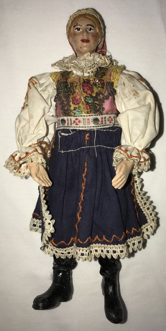 Saba Bucherer Peasant Woman Doll: Saba Bucherer doll, woman in peasant garb, w/"ball" joints, metal head and hands, handpainted features and hair, 2 small chips to face (above eyebrow and on chin), hair shows chips/discoloration, coul