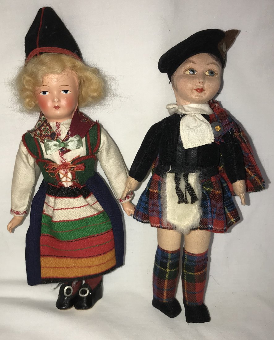 Lot of 2 Vintage Dolls: Lot of 2 Vintage Dolls: Cloth doll in Scottish garb w/handpainted features, "penned" hair, marked on left foot Made In England by Norah Wellings, in traditional Tartan garb, safety pin holding kilt fl
