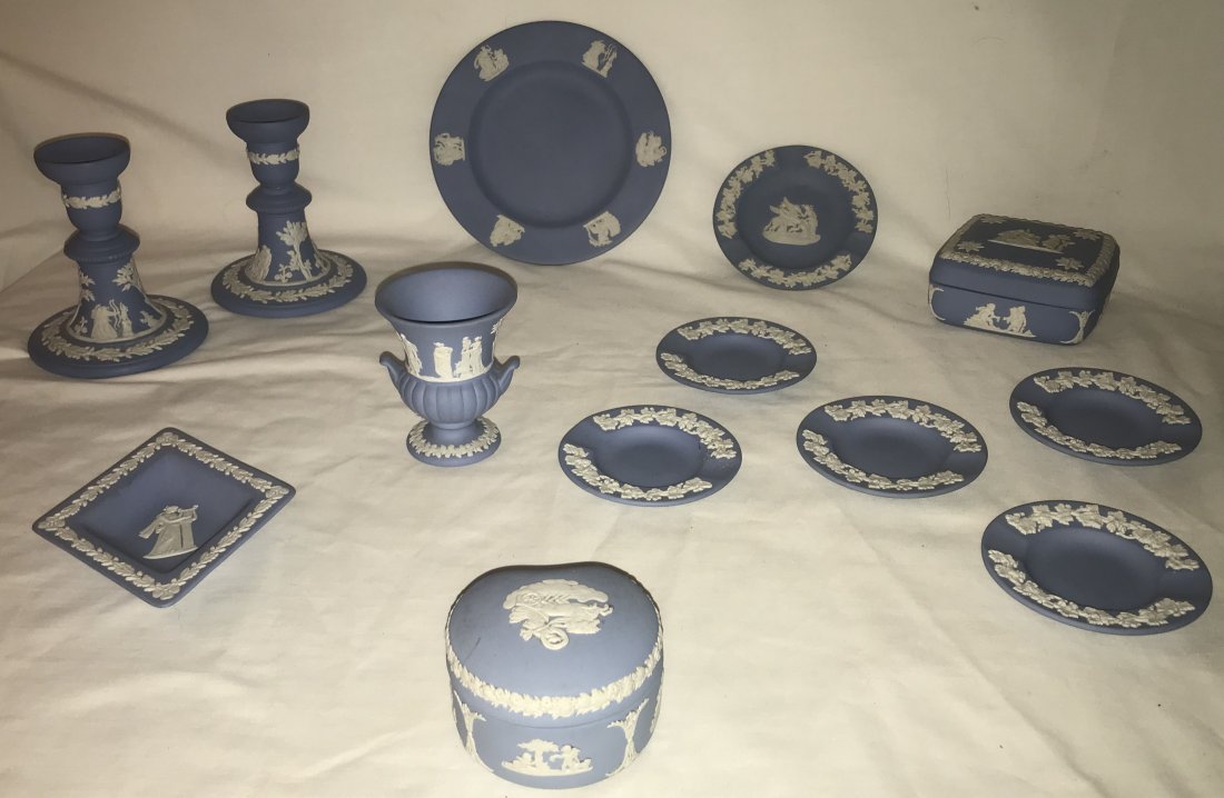 English Wedgwood Pieces: English Wedgwood blue jasperware collection-13 pieces: pair of matching candlesticks, each 4" T; round plate, 6 5/8" diameter; dresser box, 1 7/8" T x 3" W; diamond shaped dish, 5 5/8" T x 4 1/2" W; s