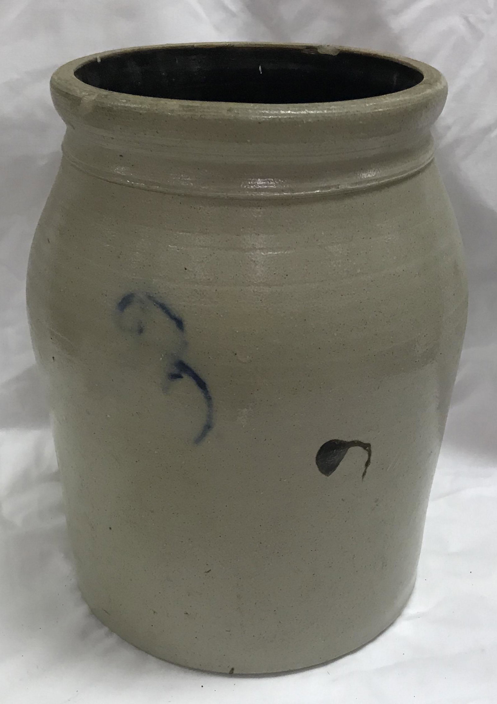 Blue Decorated Stoneware Crock: Blue decorated stoneware crock w/"3" type design, (2) visible rim chips, brown glaze "blob", 13 1/4" T x 9" base diameter