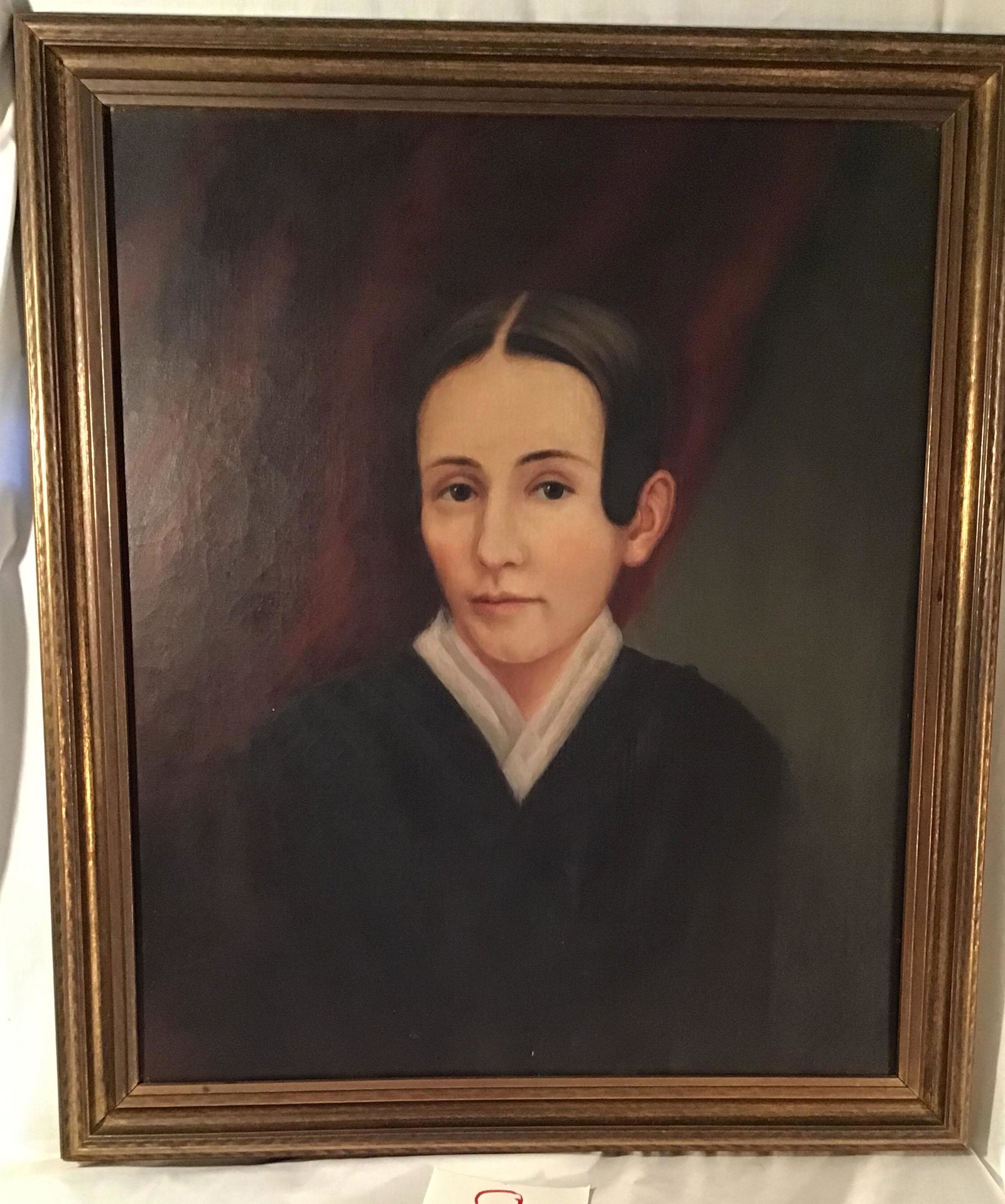 Oil on Canvas-Portrait: Oil on canvas portrait of a young personl dressed in black w/white collar, unsigned, mounted in a molded frame; image 24" x 20"; frame 27 1/2" x 23 1/4"