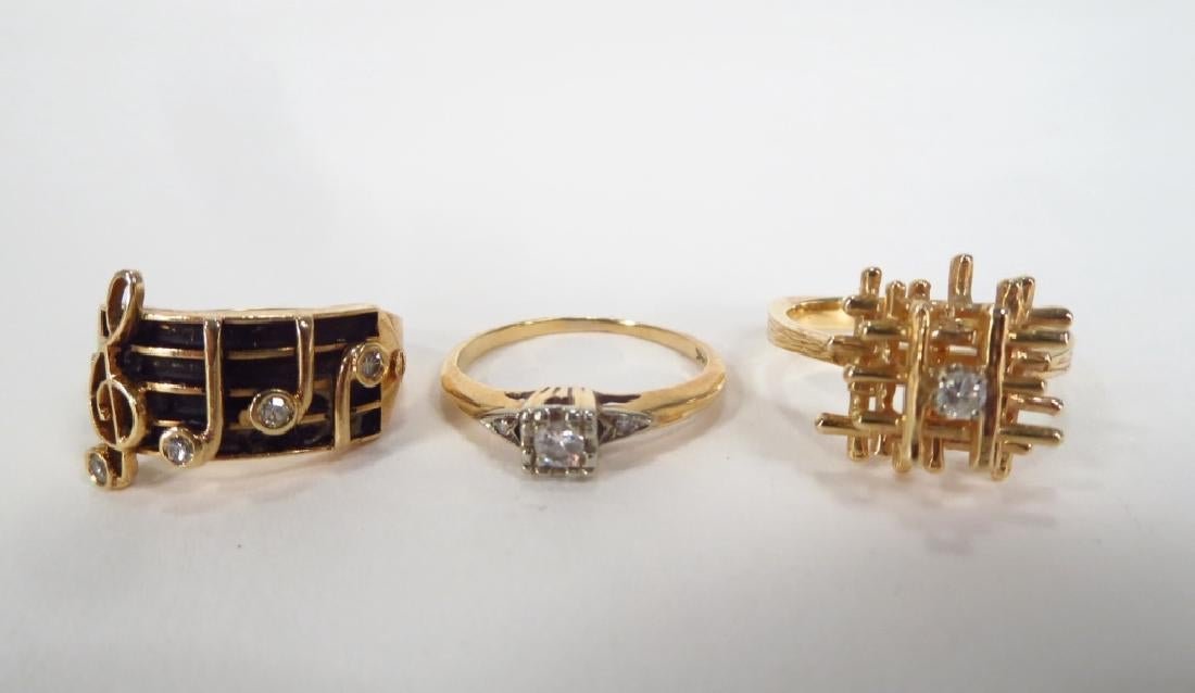 THREE 14K GOLD DIAMOND RING (1 of 4)