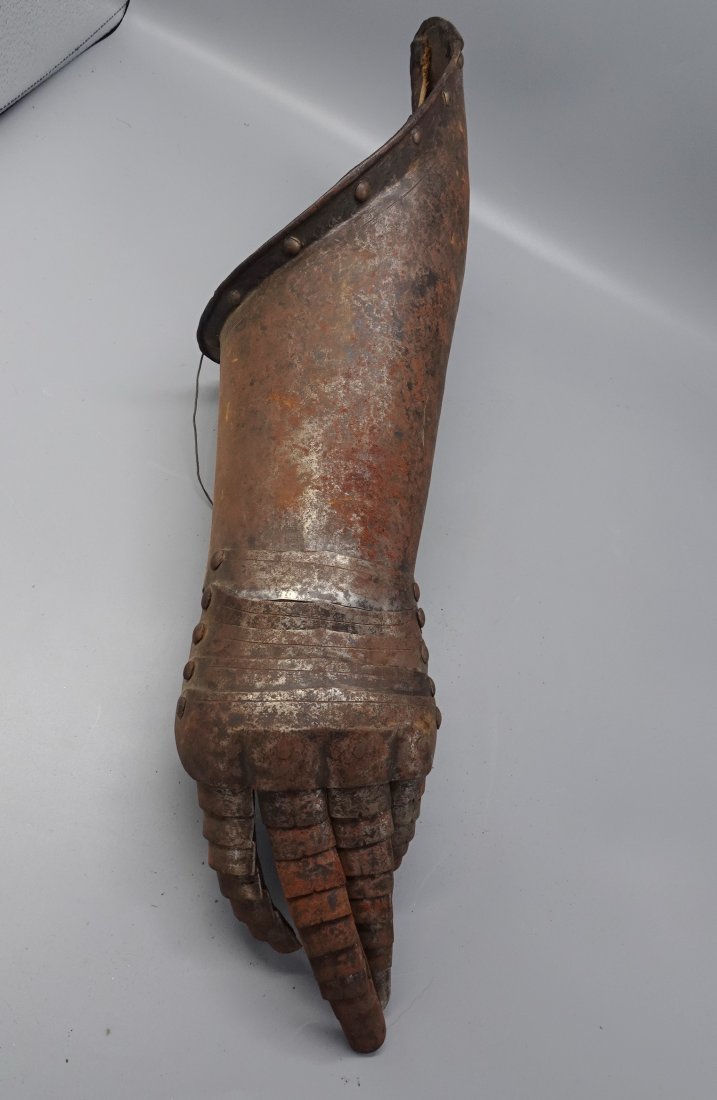 MEDIEVAL ARMOUR: Medieval piece of Armour including forearm and fingers-measures 18" long-two fingers have detached as seen-ALL PACKING & SHIPPING IS OUTSOURCED.Purchases can be picked up at our Ho-ho-kus gallery by a