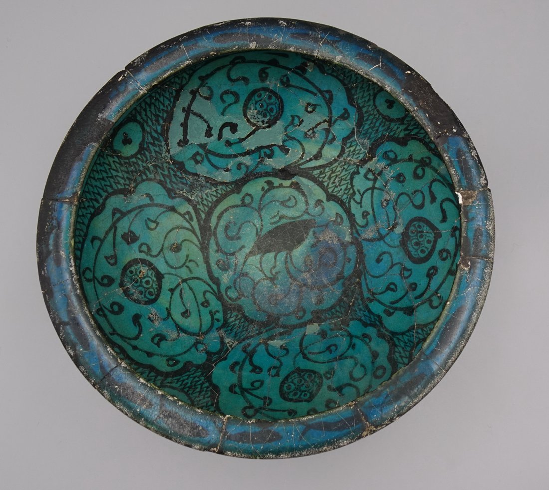 ANCIENT ISLAMIC 13c POTTERY BOWL: Islamic Ancient Sultanabad pottery bowl 13th century possibly older-Turquoise blue & black with central crow in roundel-Crow repeated on outside of bowl as well. ----ALL PACKING & SHIPPING IS OUTSOURC