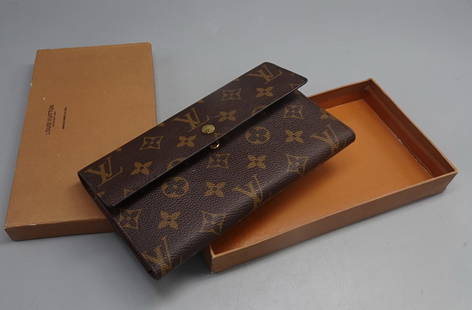 VINTAGE  LOUIS VUITTON WALLET: A beautiful well kept vintage Louis Vuitton Wallet in original box-measures 7.5" x 4.25" across and is in excellent vintage condition---All small and medium items can be shipped inhouse -All large ite