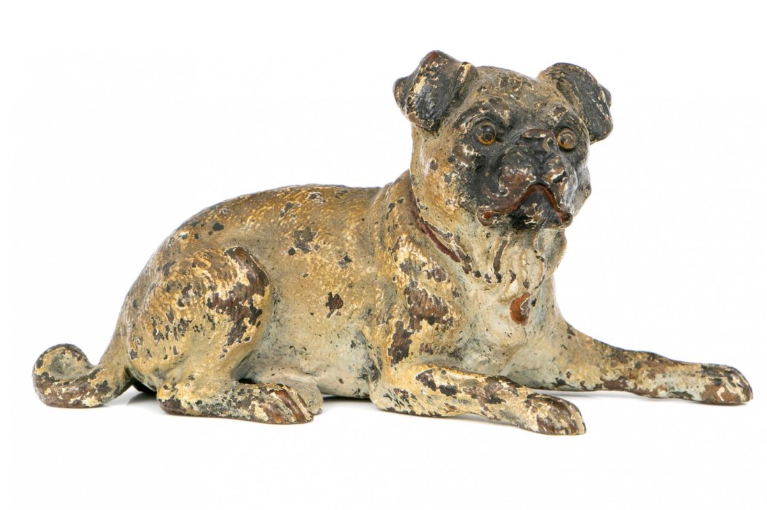 AUSTRIAN VIENNA COLD PAINTED SIGNED BRONZE PUG DOG STATUE SCULPTURE: Cold painted Vienna bronze figure of a reclining pug or bull dog figure-- Incised foundry mark M|SCH on verso--Dimensions: 3" L, 1" W x 1 1/2" H--Condition: paint loss and wear as seen.--From the Esta