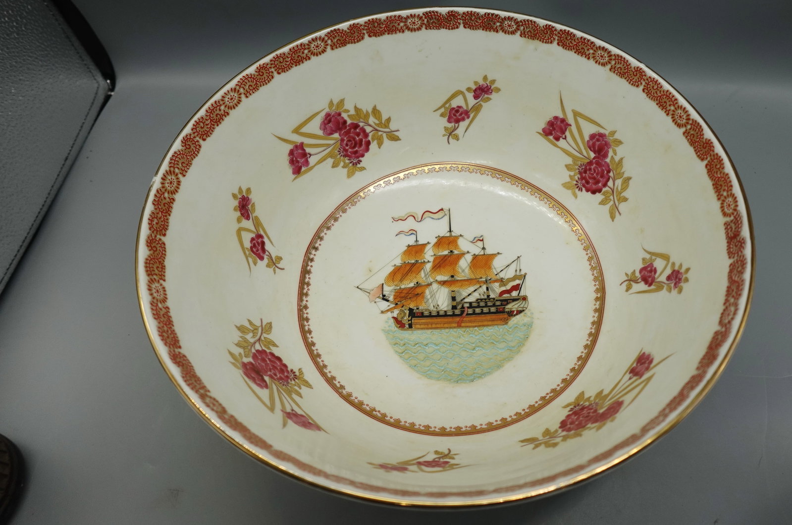 CHINESE EXPORT ARMORIAL LARGE PORCELAIN CENTER BOWL: A wonderful Chinese export bowl densely potted with intricate hand painted decoration-fully stamped at base-measures 12.5" across and 6.5" tall-is free from damage