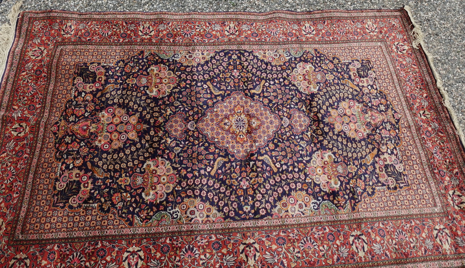 ANTQUE PERSIAN SILK CARPET: A beautiful well maintained carpet measures 88" x 55" across-in good clean condition---From the Estate of Barbara Kanash art dealer and collector Saddle River NJ----Purchases can be picked up at our H